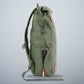 PAKAMA-fitness rucksack-gruen-seite-flaschenhalter-reißverschluss
